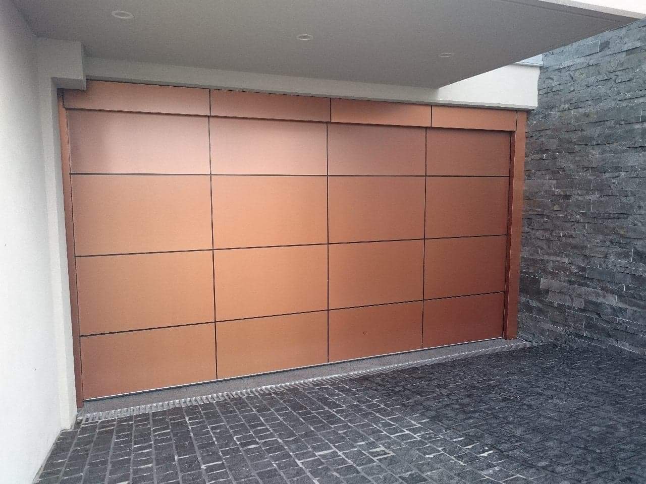 Sectional garage door installation project Auckland